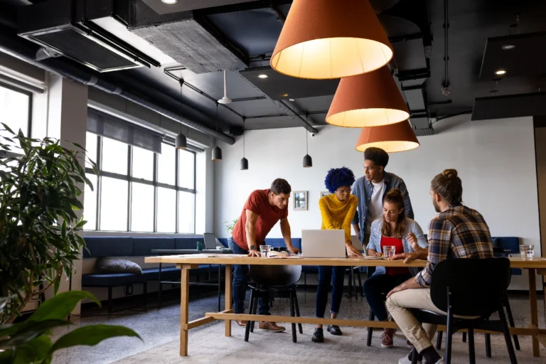 People getting to collaborate in a shared workspace, a key reason why coworking spaces are so popular today